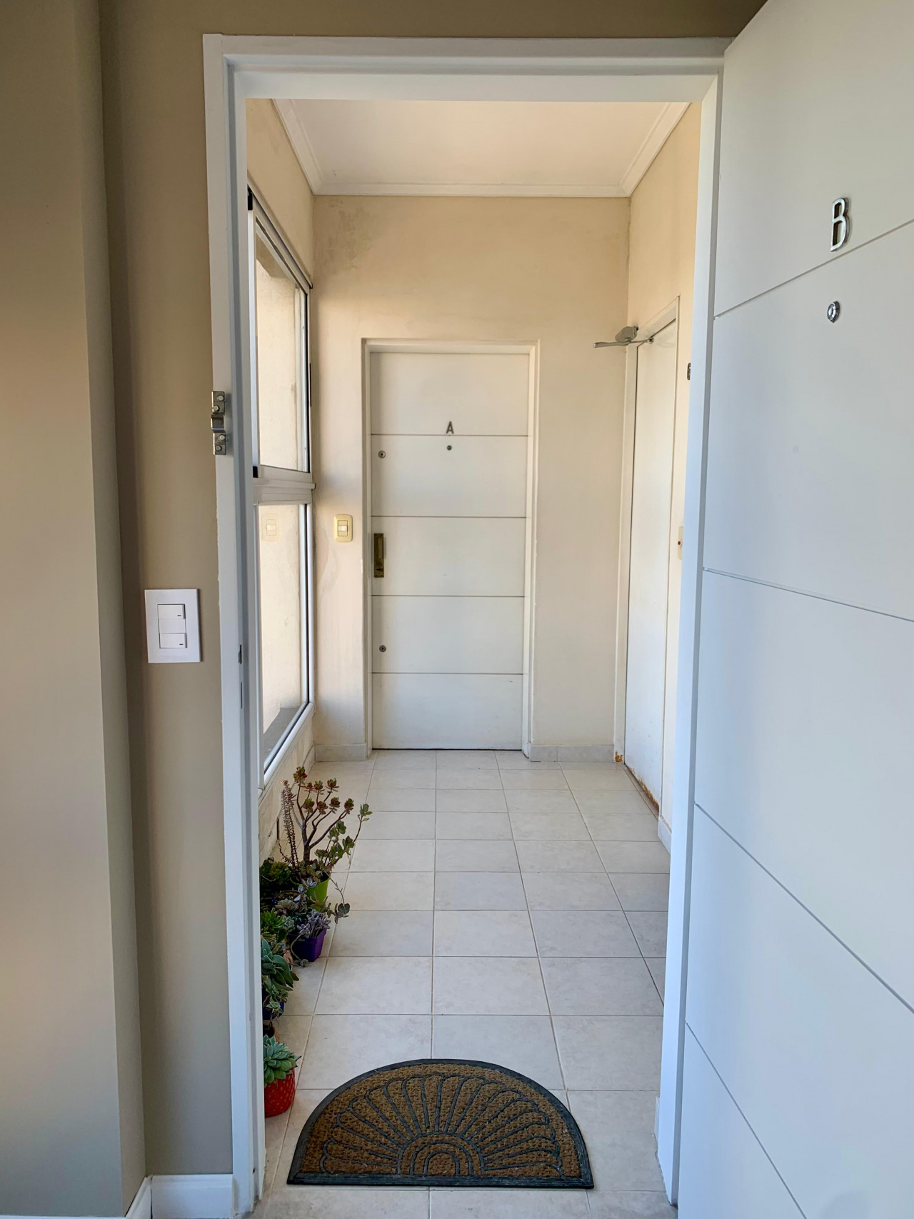 hall recibidor de piso solo dos deptos por planta